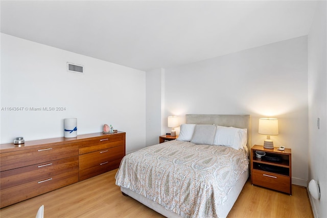 bedroom with light wood-type flooring