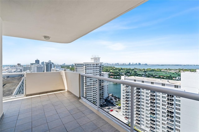 balcony featuring a water view