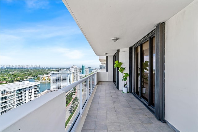 balcony featuring a water view