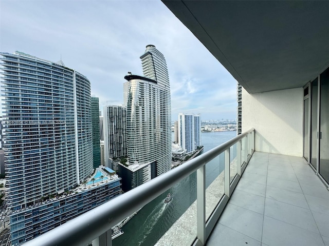 balcony featuring a water view