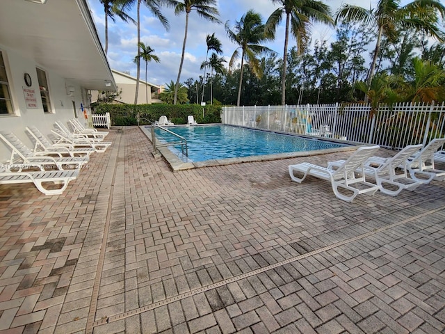 view of swimming pool featuring a patio