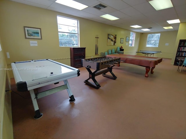 rec room featuring pool table, a healthy amount of sunlight, and a paneled ceiling