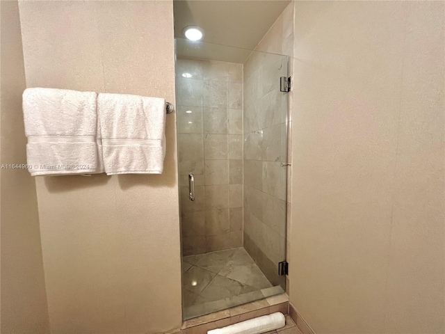 bathroom with an enclosed shower