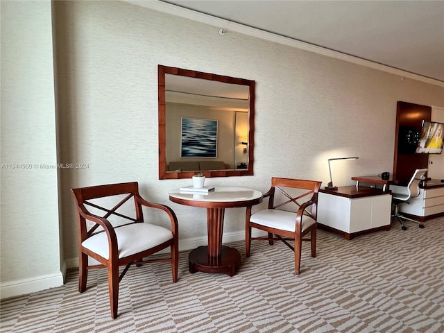 living area featuring light colored carpet and ornamental molding