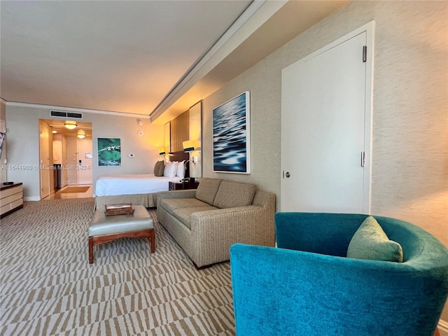 bedroom featuring light colored carpet