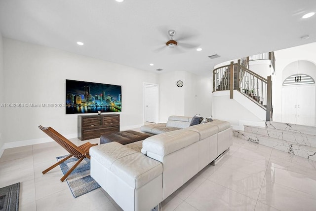 living room featuring ceiling fan