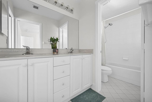 full bathroom with shower / bath combo, tile patterned flooring, vanity, and toilet