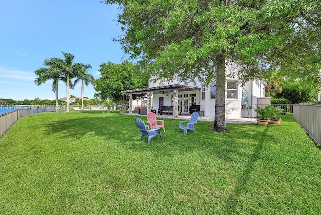 view of yard featuring ceiling fan