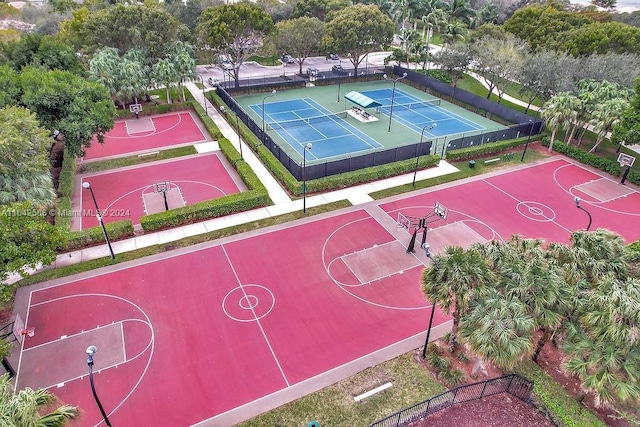 view of basketball court featuring tennis court