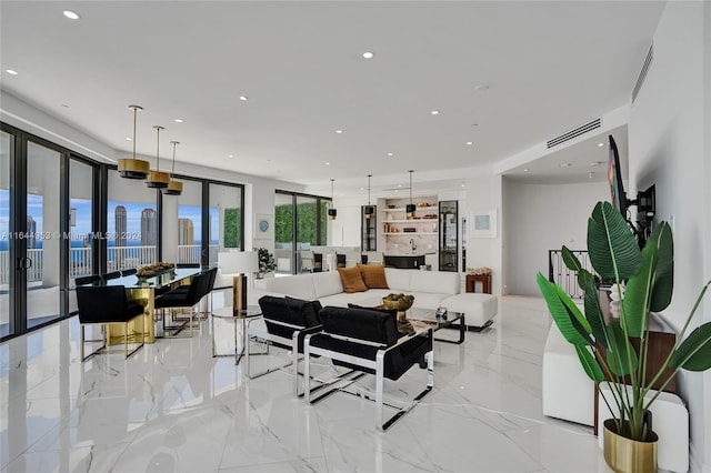 living room with light tile patterned flooring and french doors