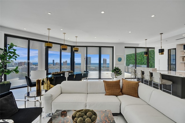 living room with a city view and recessed lighting