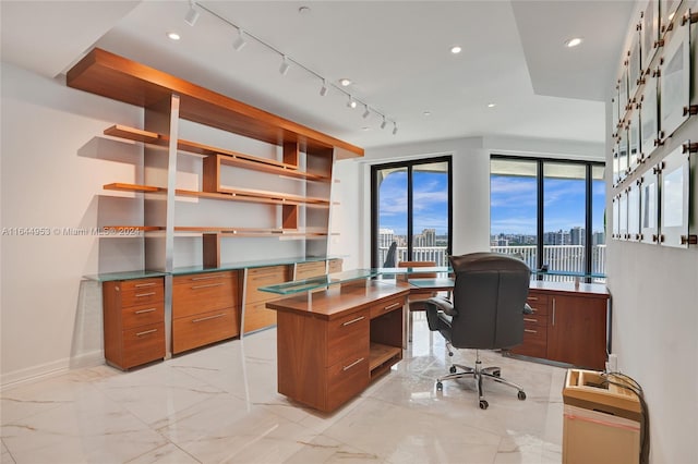 home office featuring a view of city, marble finish floor, baseboards, and recessed lighting