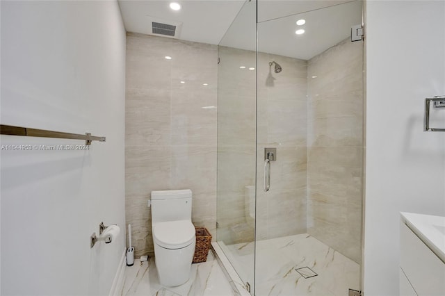 bathroom with a shower with shower door, tile walls, toilet, and tile patterned floors