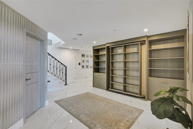 interior space featuring light tile patterned flooring