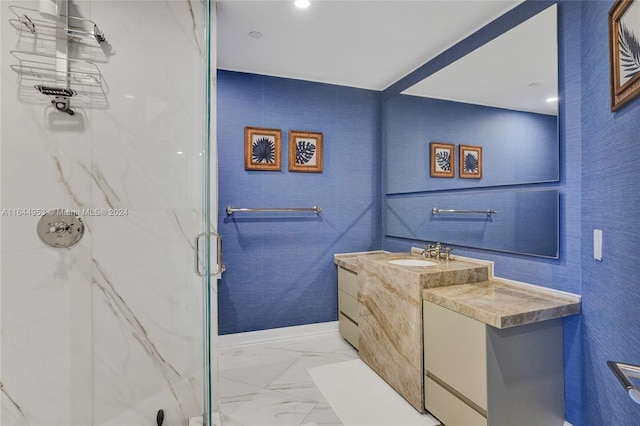 bathroom with tile patterned floors, a shower with door, and vanity