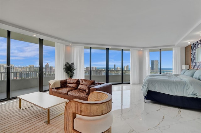 bedroom with a view of city, access to outside, marble finish floor, and floor to ceiling windows