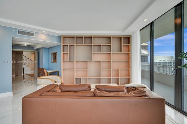 living area featuring marble finish floor, stairway, visible vents, and recessed lighting