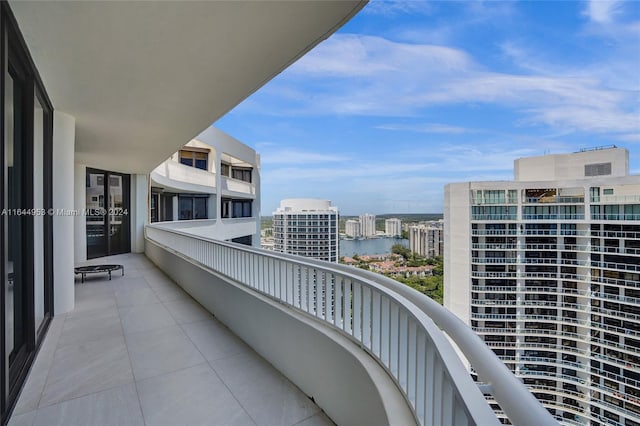 balcony featuring a water view