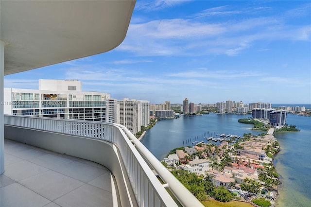 balcony featuring a water view