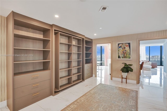 living area featuring light tile patterned floors