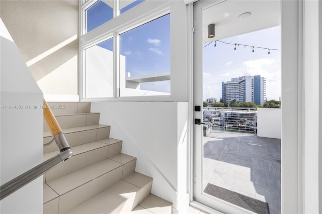 stairs featuring a wealth of natural light