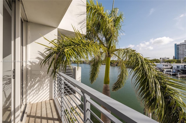 balcony featuring a water view