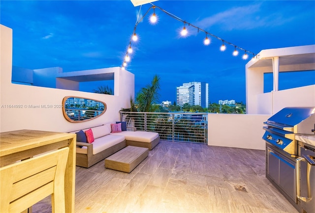 view of patio / terrace featuring area for grilling and outdoor lounge area