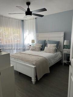 bedroom featuring ceiling fan and hardwood / wood-style flooring