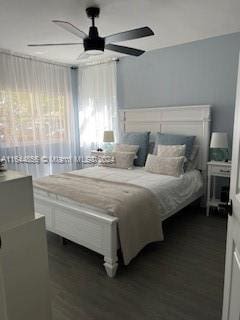 12124 Saint Andrews Pl Unit 112, Miramar, FL 33025 - bedroom featuring dark wood finished floors and ceiling fan