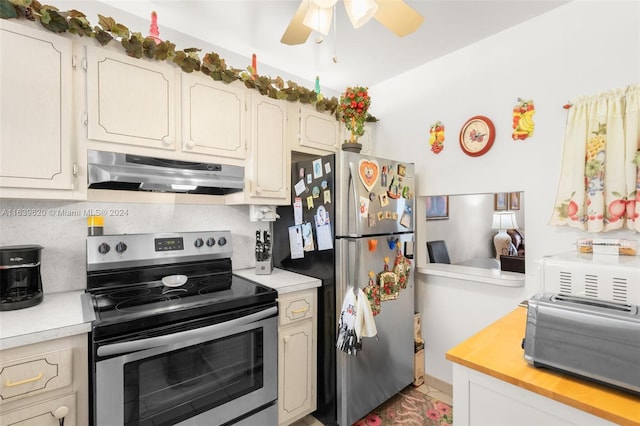 kitchen featuring decorative backsplash, tile patterned flooring, ceiling fan, and appliances with stainless steel finishes