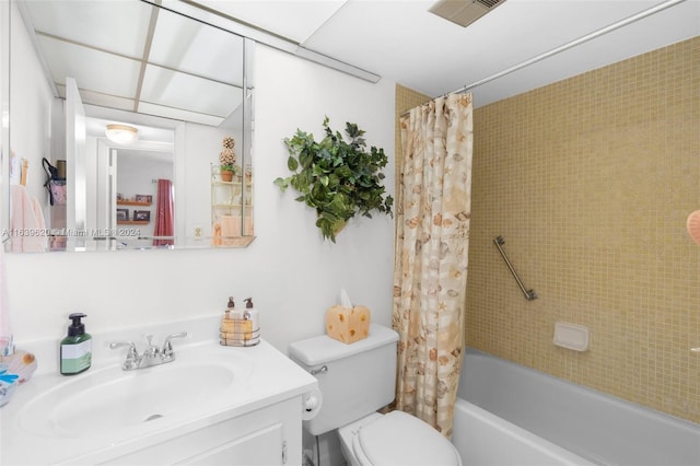 full bathroom featuring toilet, shower / bathtub combination with curtain, and vanity