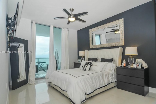 bedroom featuring multiple windows, access to outside, and ceiling fan