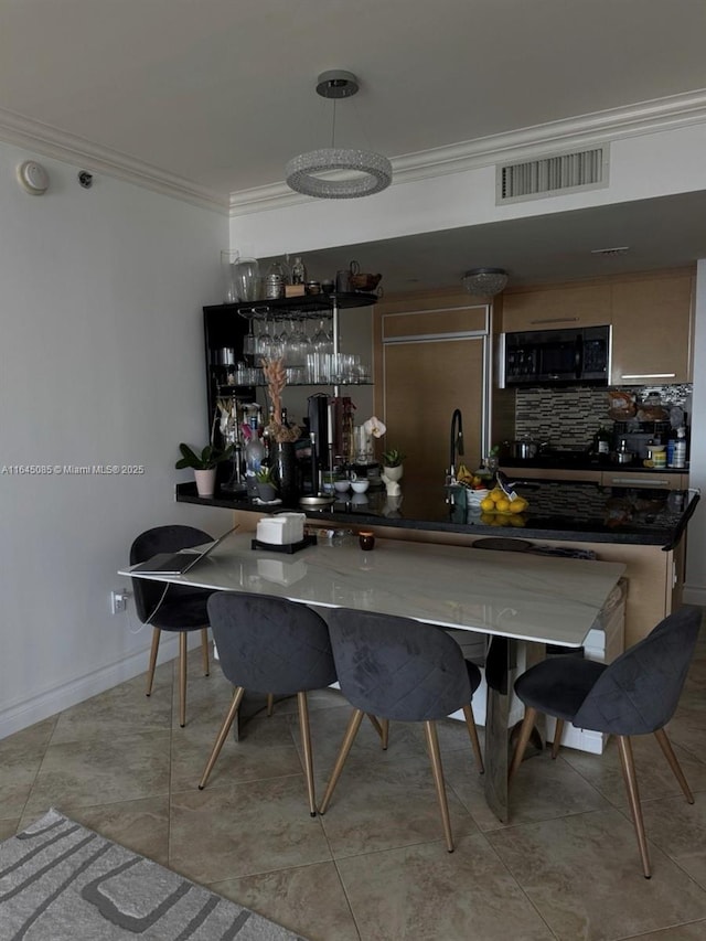 1850 S Ocean Dr Unit 3809, Hallandale Beach, FL 33009 - indoor bar featuring crown molding and backsplash