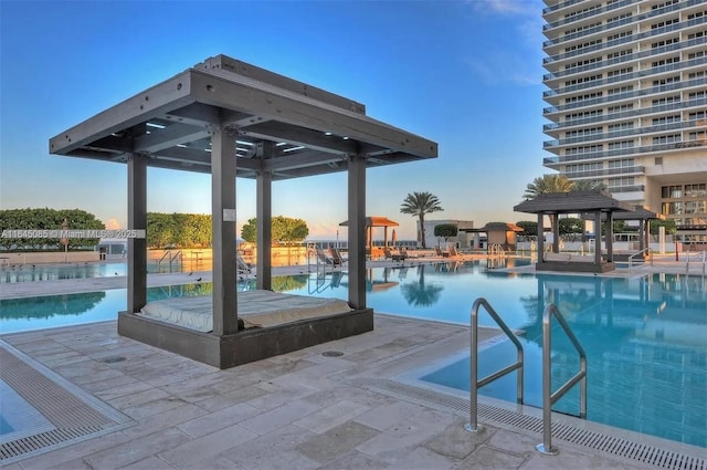 1850 S Ocean Dr Unit 3809, Hallandale Beach, FL 33009 - pool at dusk with a community pool