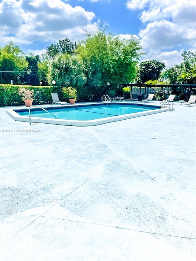 pool featuring a patio