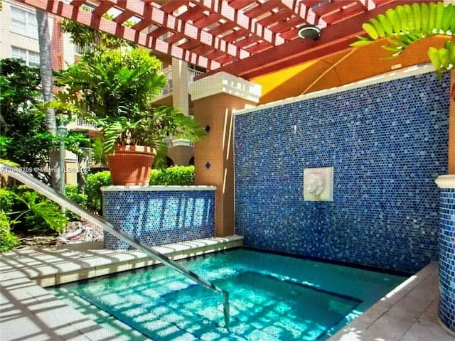 view of pool with a pergola