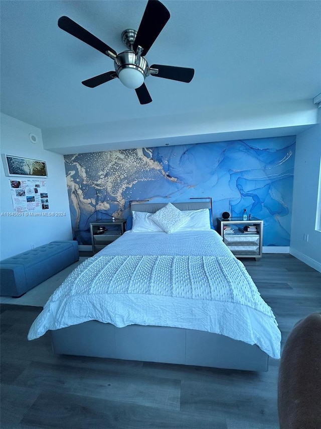 bedroom featuring ceiling fan and hardwood / wood-style flooring