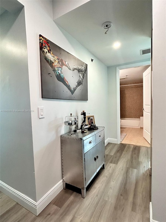 hall featuring light hardwood / wood-style floors