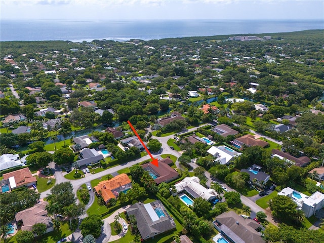 bird's eye view with a water view