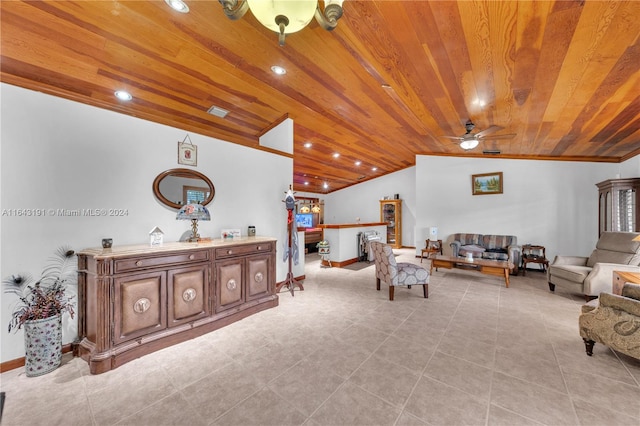 interior space featuring ceiling fan, wood ceiling, light tile patterned flooring, and lofted ceiling