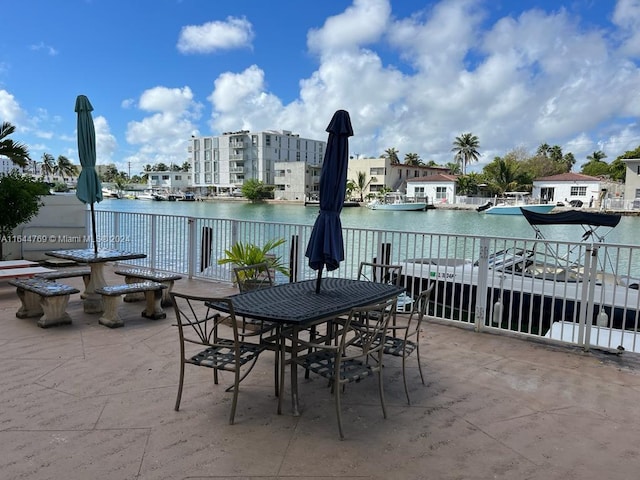 view of patio with a water view