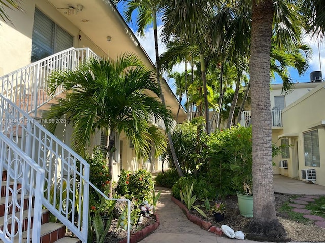 8420 Byron Ave Unit 4, Miami Beach, FL 33141 - view of home's community with stairs and a cooling unit
