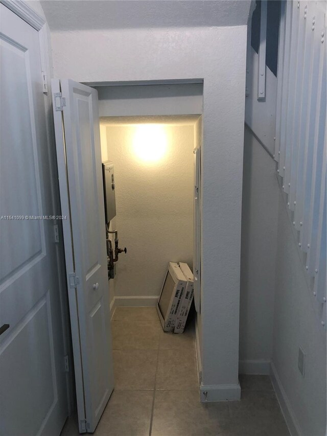 interior space featuring light tile patterned flooring