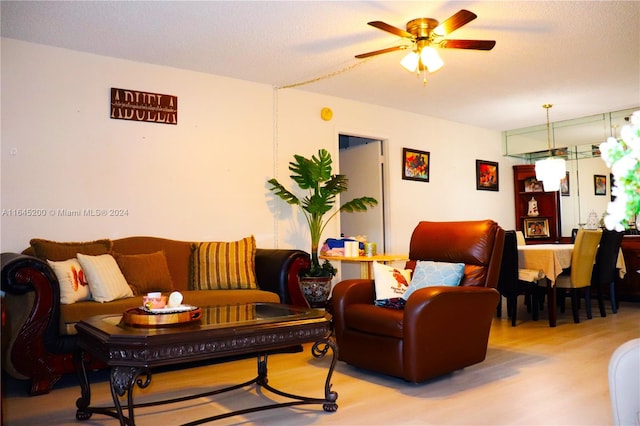900 Saint Charles Pl Unit 316, Pembroke Pines, FL 33026 - living area with wood finished floors and a ceiling fan