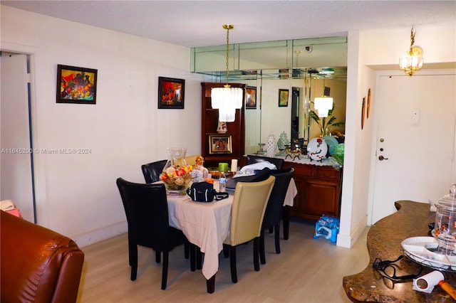 900 Saint Charles Pl Unit 316, Pembroke Pines, FL 33026 - dining room with light wood-type flooring
