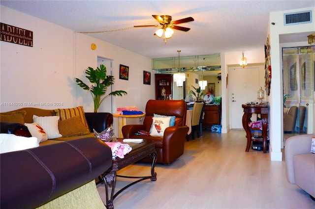 900 Saint Charles Pl Unit 316, Pembroke Pines, FL 33026 - living area with a ceiling fan and wood finished floors