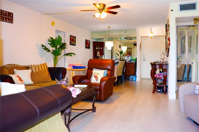 900 Saint Charles Pl Unit 316, Pembroke Pines, FL 33026 - living room featuring ceiling fan and wood finished floors