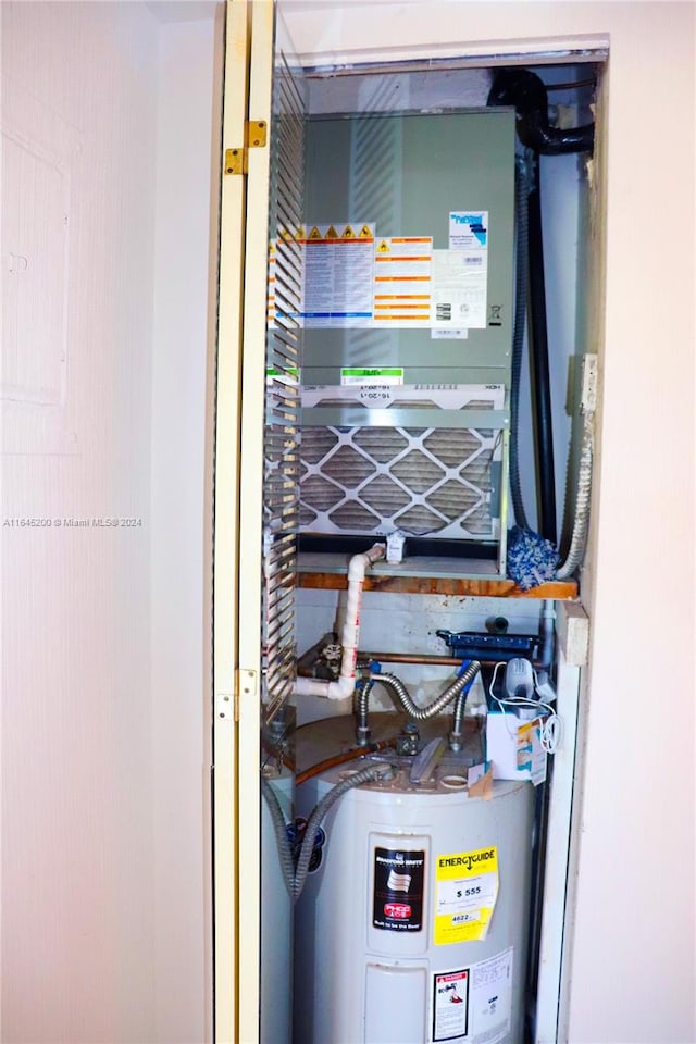 900 Saint Charles Pl Unit 316, Pembroke Pines, FL 33026 - utility room with electric water heater