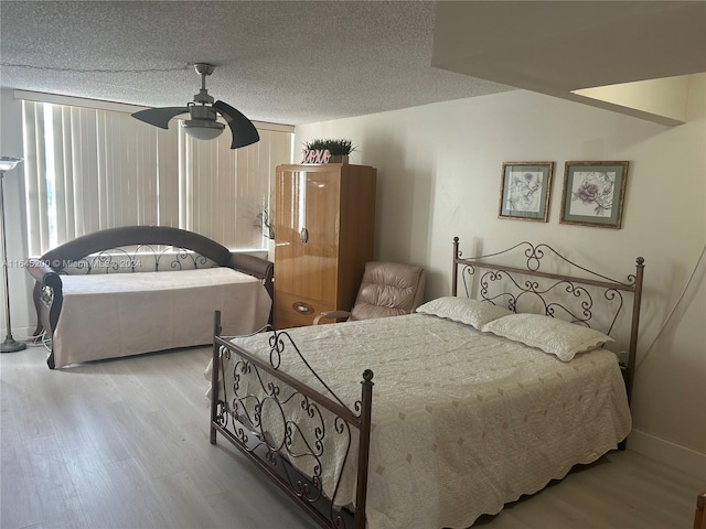 900 Saint Charles Pl Unit 316, Pembroke Pines, FL 33026 - bedroom featuring wood finished floors and a ceiling fan