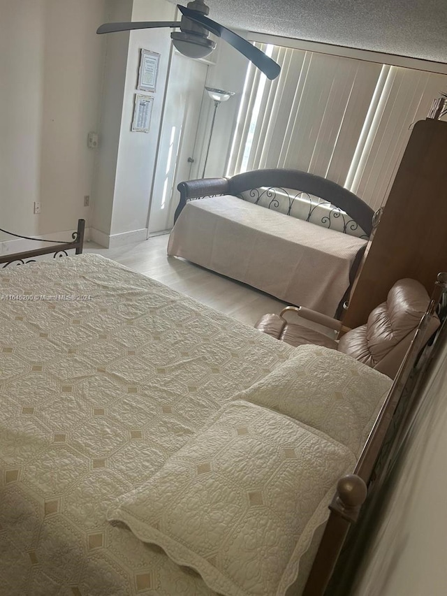 900 Saint Charles Pl Unit 316, Pembroke Pines, FL 33026 - bedroom featuring wood finished floors and baseboards